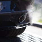 What causes a backfire in the exhaust